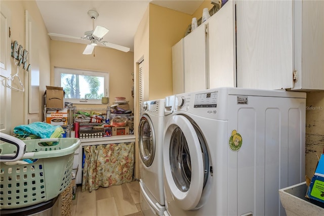 2202 Donato Dr, Belleair Beach, FL 33786 - clothes washing area featuring cabinet space, a ceiling fan, washer and clothes dryer, and light wood-style flooring