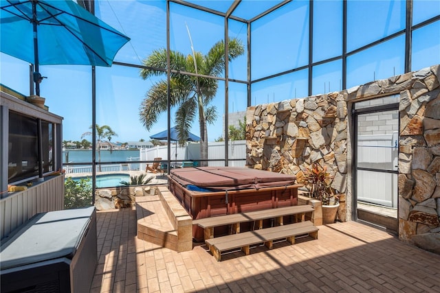 2202 Donato Dr, Belleair Beach, FL 33786 - view of patio / terrace with a fenced backyard, a swimming pool, glass enclosure, and a covered hot tub