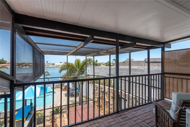 2202 Donato Dr, Belleair Beach, FL 33786 - sunroom featuring a water view