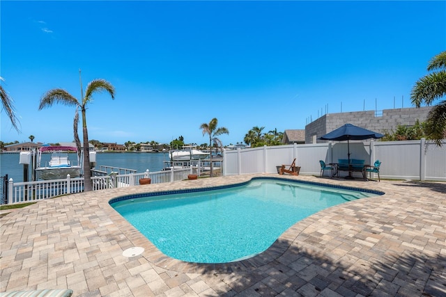 2202 Donato Dr, Belleair Beach, FL 33786 - view of pool with boat lift, a fenced backyard, a boat dock, a fenced in pool, and a patio area