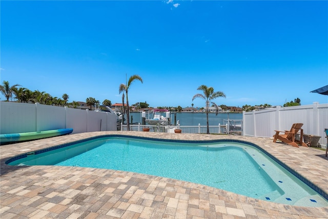 2202 Donato Dr, Belleair Beach, FL 33786 - view of swimming pool featuring a fenced in pool, a water view, a fenced backyard, and a patio area