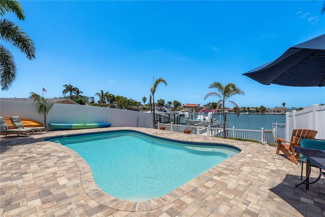 2202 Donato Dr, Belleair Beach, FL 33786 - view of pool featuring a fenced in pool, a fenced backyard, and a patio area