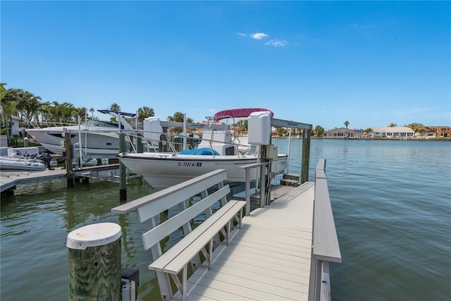 2202 Donato Dr, Belleair Beach, FL 33786 - dock area with boat lift and a water view