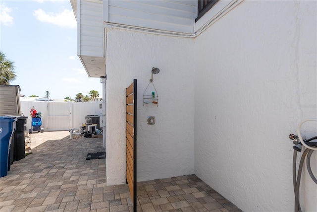 2202 Donato Dr, Belleair Beach, FL 33786 - view of patio featuring central air condition unit