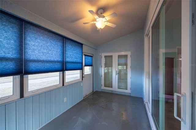 unfurnished sunroom with french doors