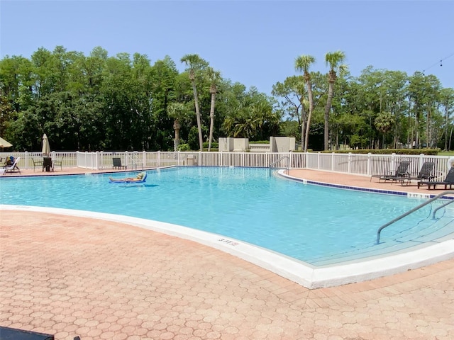 3311 Teeside Dr, New Port Richey, FL 34655 - pool featuring a patio and fence