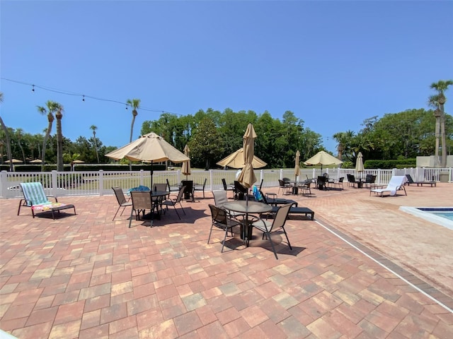 3311 Teeside Dr, New Port Richey, FL 34655 - view of patio / terrace featuring fence and outdoor dining area