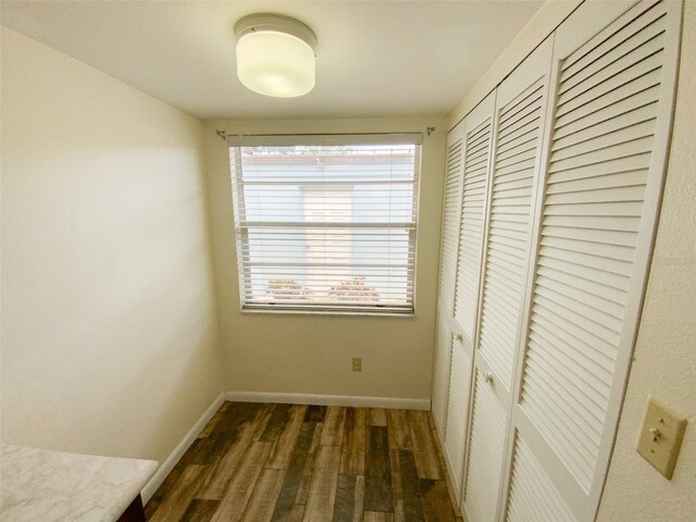 3311 Teeside Dr, New Port Richey, FL 34655 - hall with dark wood-type flooring and baseboards