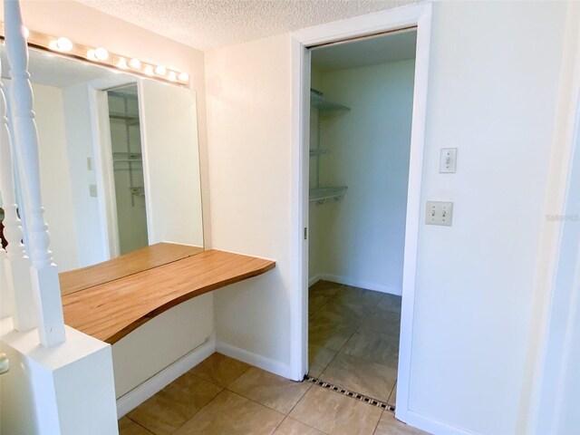3311 Teeside Dr, New Port Richey, FL 34655 - bathroom with tile patterned floors and a textured ceiling