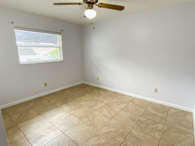 3311 Teeside Dr, New Port Richey, FL 34655 - spare room featuring ceiling fan and light tile patterned floors