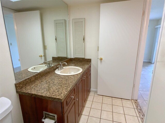 3311 Teeside Dr, New Port Richey, FL 34655 - bathroom with vanity and tile patterned flooring