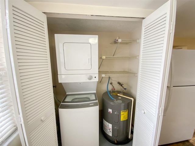 3311 Teeside Dr, New Port Richey, FL 34655 - washroom featuring water heater and stacked washer and clothes dryer