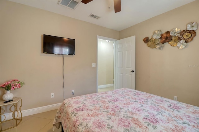 bedroom with baseboards, tile patterned flooring, ceiling fan, and visible vents