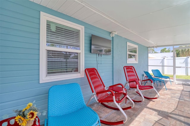 view of patio / terrace featuring fence
