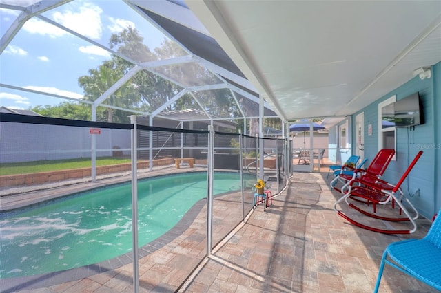 view of pool featuring a fenced in pool, a lanai, a patio area, and fence