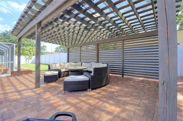 view of patio / terrace featuring a pergola, outdoor lounge area, and fence