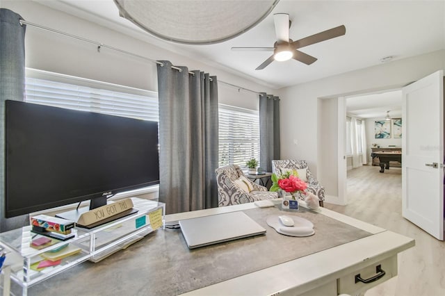interior space with a ceiling fan