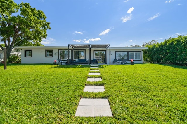 rear view of property featuring a pergola, an outdoor hangout area, stucco siding, a patio area, and a yard