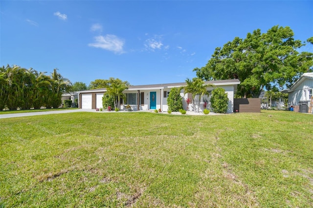 3922 Fontainebleau Dr, Tampa, FL 33634 - single story home with a garage, driveway, and a front yard