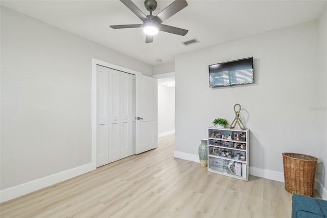 3922 Fontainebleau Dr, Tampa, FL 33634 - bedroom featuring wood finished floors, baseboards, a closet, and ceiling fan