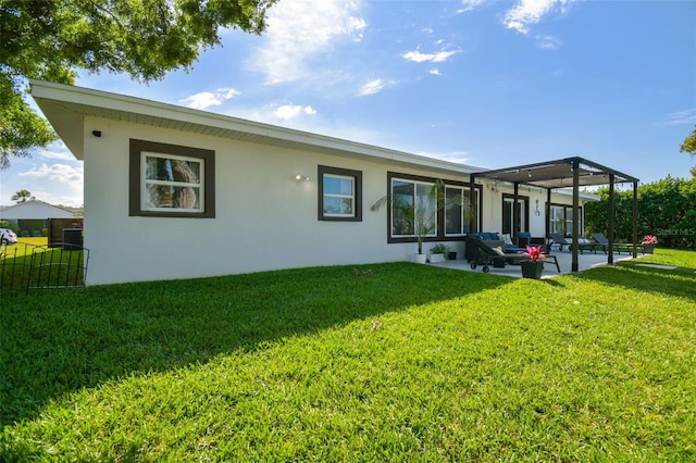 3922 Fontainebleau Dr, Tampa, FL 33634 - rear view of property with outdoor lounge area, a patio area, and stucco siding