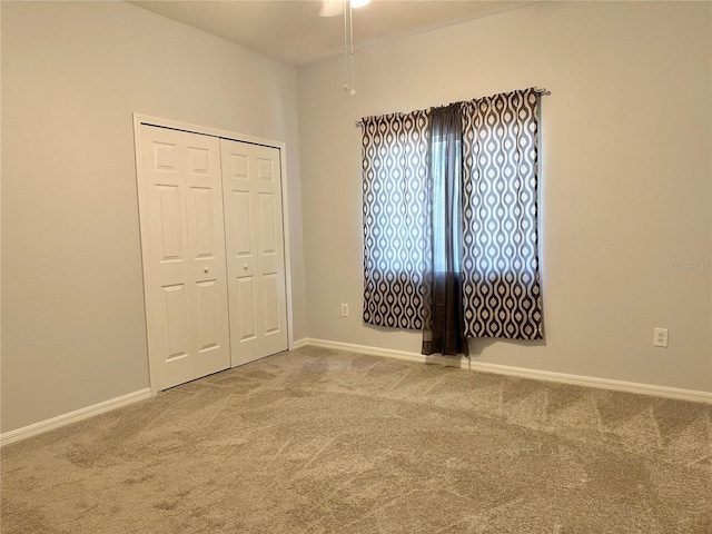 2820 Pankaw Ln, Valrico, FL 33596 - unfurnished bedroom with carpet, baseboards, and a closet