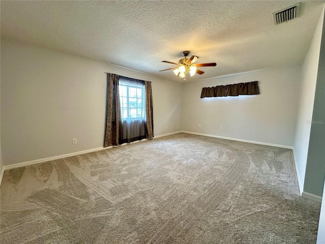 2820 Pankaw Ln, Valrico, FL 33596 - unfurnished room featuring carpet floors, a ceiling fan, a textured ceiling, and baseboards