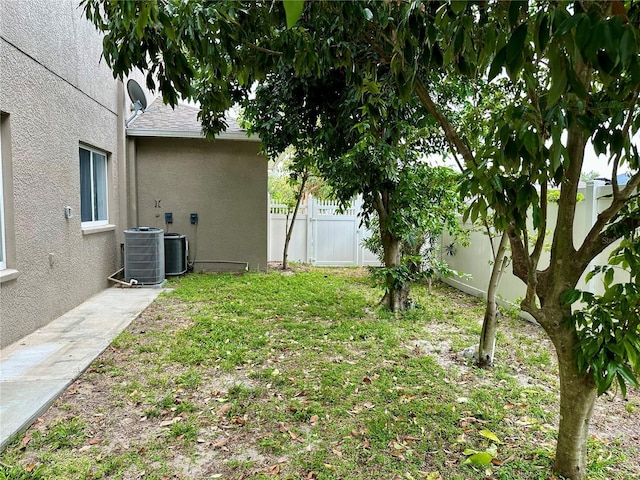 2820 Pankaw Ln, Valrico, FL 33596 - fenced backyard featuring central AC