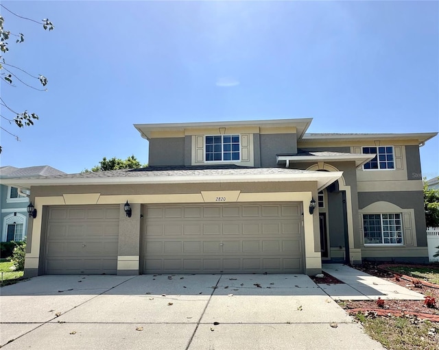 2820 Pankaw Ln, Valrico, FL 33596 - view of front facade featuring stucco siding and concrete driveway
