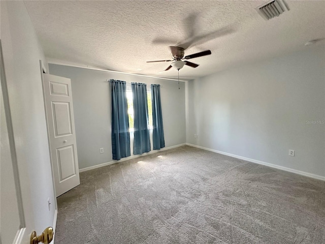 2820 Pankaw Ln, Valrico, FL 33596 - carpeted spare room featuring ceiling fan, a textured ceiling, and baseboards