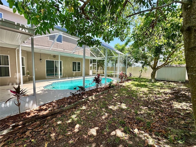 2820 Pankaw Ln, Valrico, FL 33596 - view of swimming pool featuring a fenced backyard, glass enclosure, and a patio