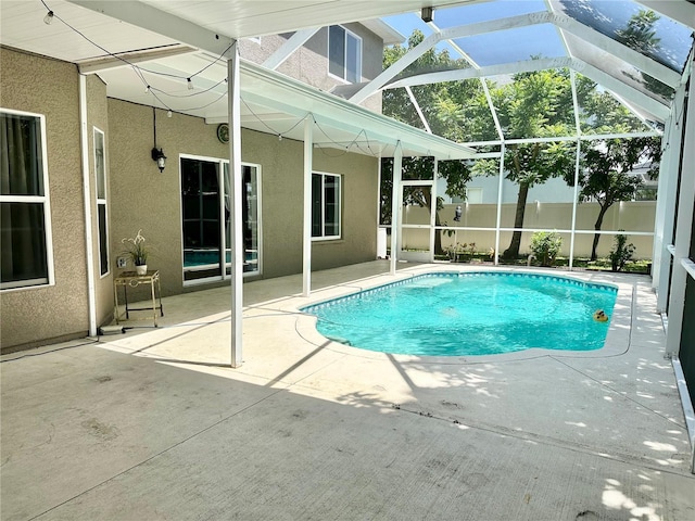 2820 Pankaw Ln, Valrico, FL 33596 - outdoor pool featuring a patio area, fence, and glass enclosure