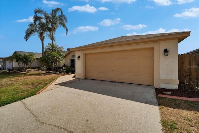 1601 Westerly Dr, Brandon, FL 33511 - view of front of property with fence, driveway, a front yard, and stucco siding