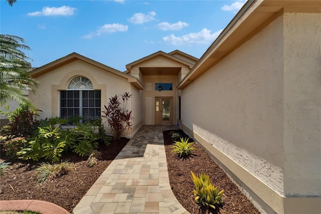 1601 Westerly Dr, Brandon, FL 33511 - doorway to property featuring stucco siding