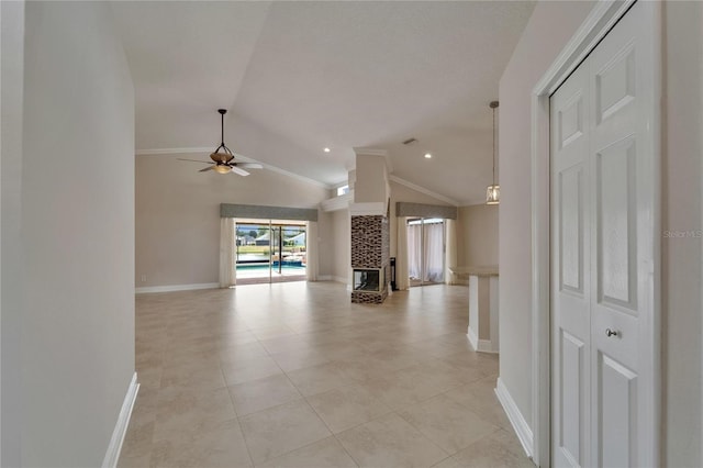 1601 Westerly Dr, Brandon, FL 33511 - unfurnished living room with baseboards, a ceiling fan, light tile patterned floors, and lofted ceiling