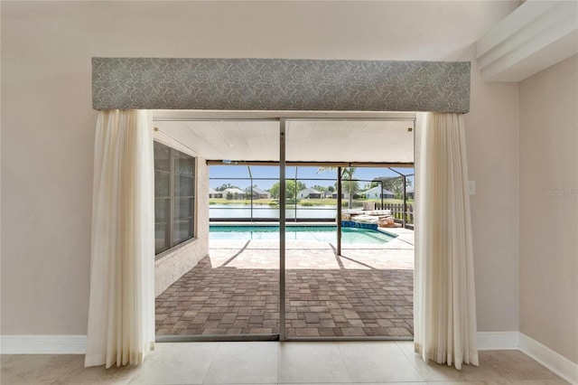 1601 Westerly Dr, Brandon, FL 33511 - entryway with a sunroom, baseboards, and floor to ceiling windows