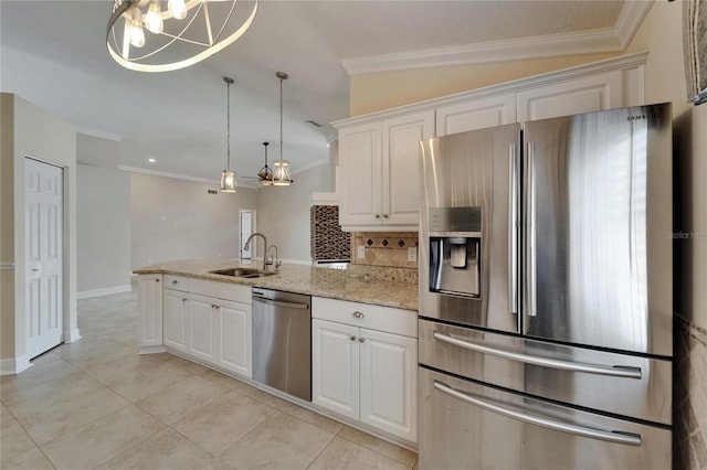1601 Westerly Dr, Brandon, FL 33511 - kitchen with a sink, a peninsula, ornamental molding, and stainless steel appliances