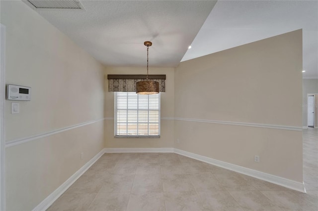 1601 Westerly Dr, Brandon, FL 33511 - empty room with baseboards, visible vents, light tile patterned floors, and lofted ceiling