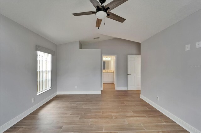 1601 Westerly Dr, Brandon, FL 33511 - unfurnished room featuring baseboards, ceiling fan, light wood-type flooring, and lofted ceiling