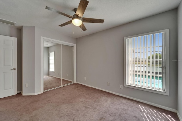1601 Westerly Dr, Brandon, FL 33511 - unfurnished bedroom featuring carpet floors, baseboards, and a closet