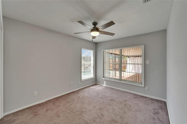 1601 Westerly Dr, Brandon, FL 33511 - empty room with carpet floors, a ceiling fan, and a textured ceiling