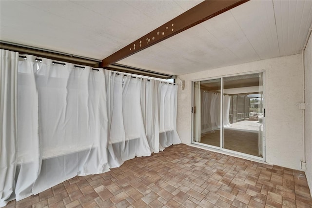 1601 Westerly Dr, Brandon, FL 33511 - interior space featuring brick floor and beam ceiling