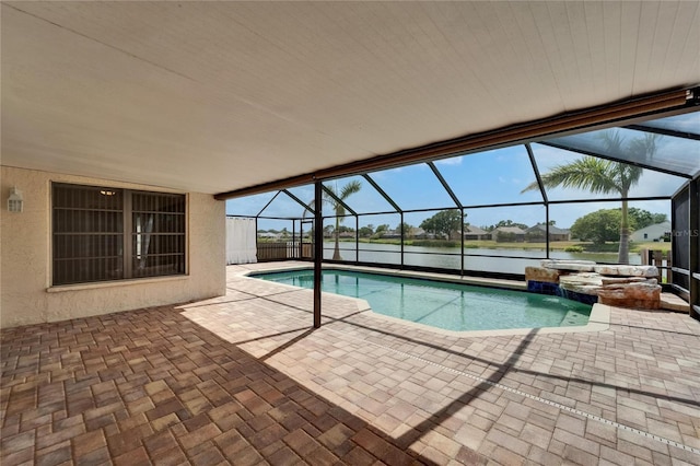 1601 Westerly Dr, Brandon, FL 33511 - outdoor pool with glass enclosure, a water view, and a patio area
