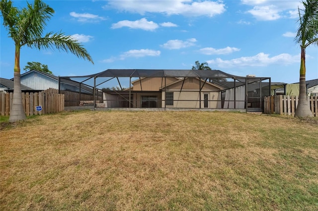 1601 Westerly Dr, Brandon, FL 33511 - exterior space featuring a fenced backyard, glass enclosure, and a yard
