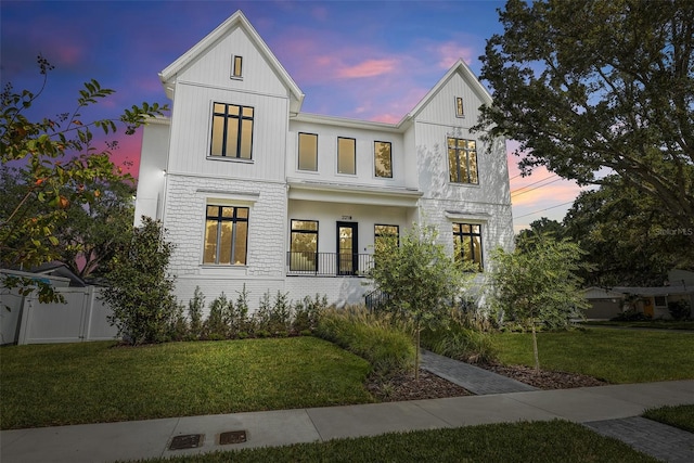 2218 S Occident St, Tampa, FL 33629 - modern farmhouse featuring a lawn and fence