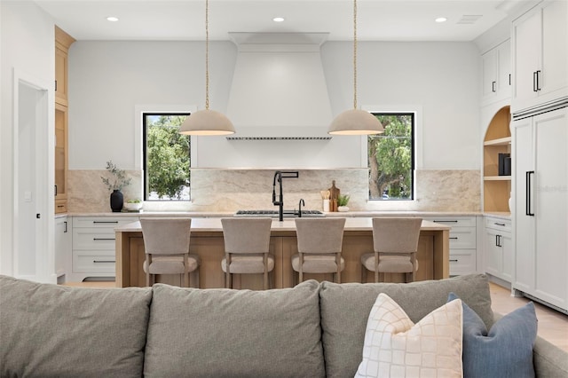 2218 S Occident St, Tampa, FL 33629 - kitchen with light countertops, open floor plan, and plenty of natural light