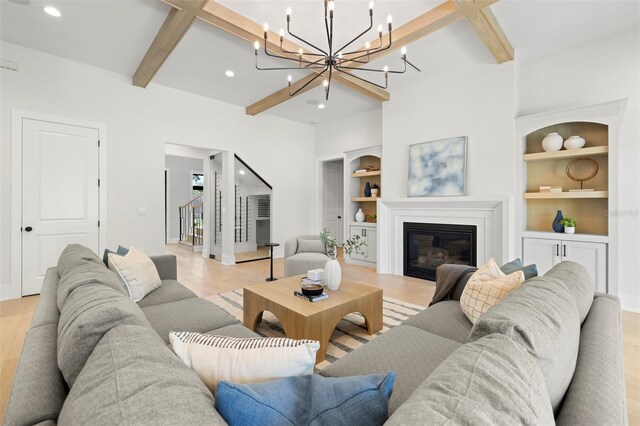 2218 S Occident St, Tampa, FL 33629 - living room with light wood-style floors, recessed lighting, and beamed ceiling