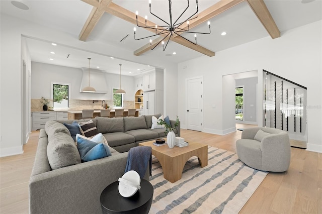 2218 S Occident St, Tampa, FL 33629 - living area featuring light wood-type flooring, baseboards, beamed ceiling, and recessed lighting
