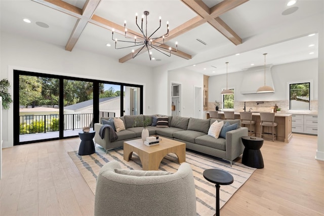 2218 S Occident St, Tampa, FL 33629 - living room featuring recessed lighting, light wood-type flooring, and coffered ceiling