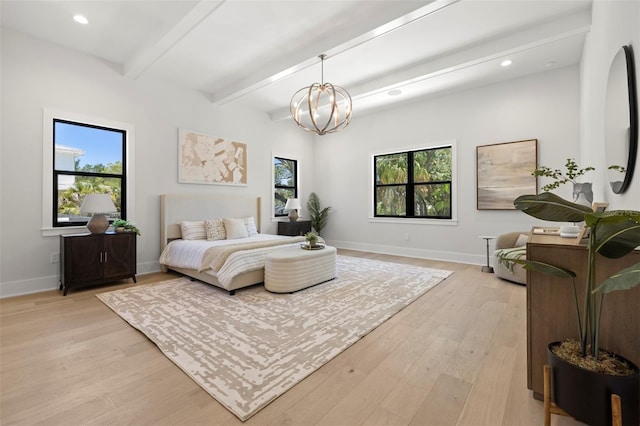 2218 S Occident St, Tampa, FL 33629 - bedroom featuring baseboards, light wood-style flooring, and beam ceiling